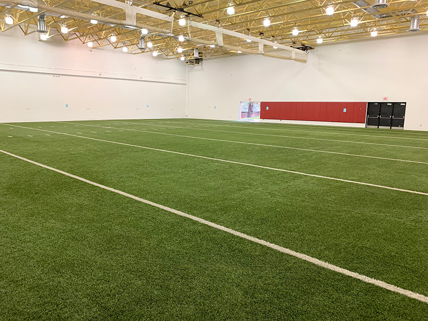Erie Community College Indoor Gym Featuring Repurposed artificial grass field turf field